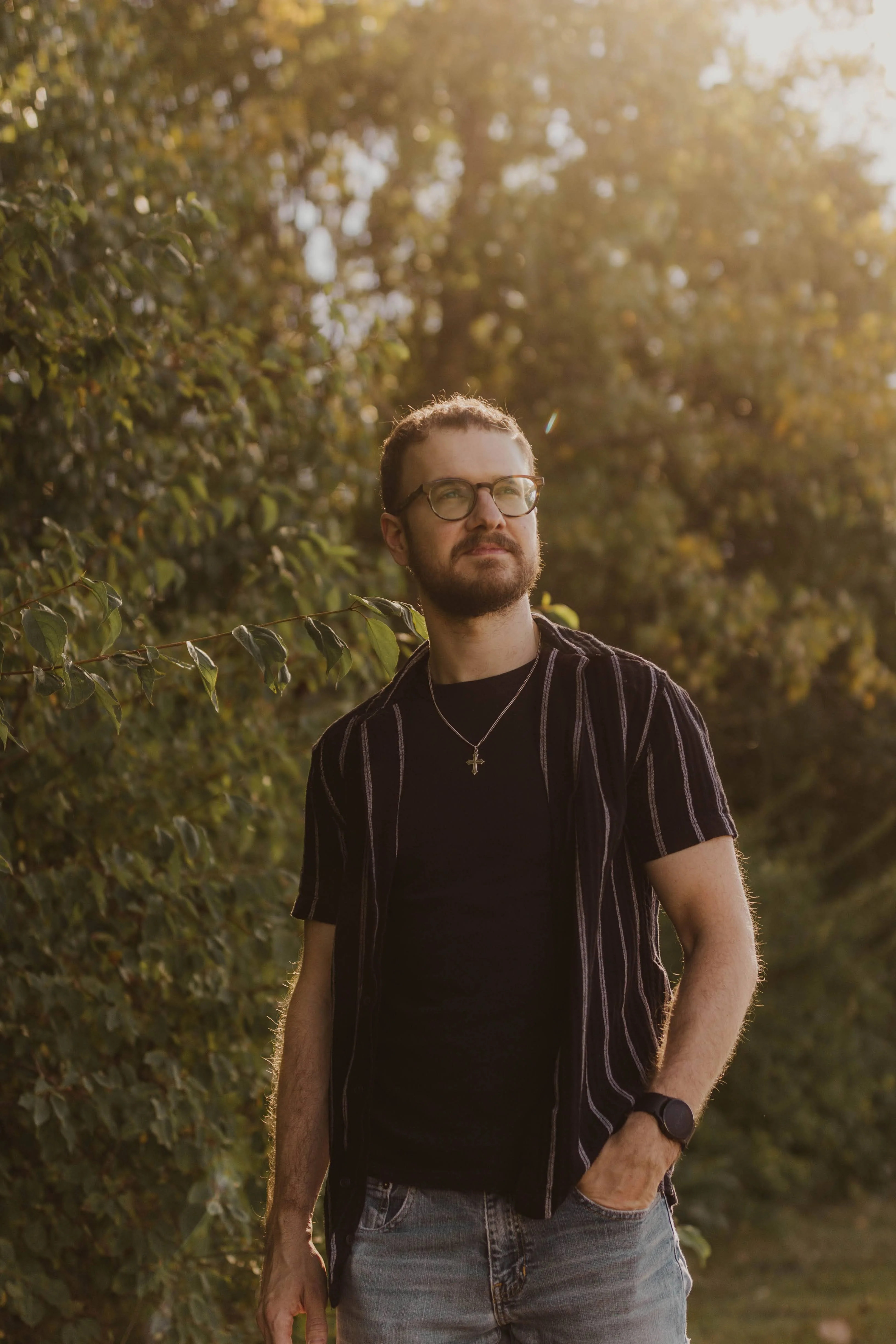 Jeremy Shull standing outdoors in warm evening light.